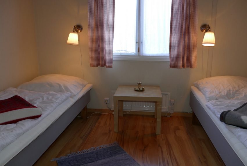 Schlafzimmer 1 mit Einzelbetten, die man auch zusammen stellen kann